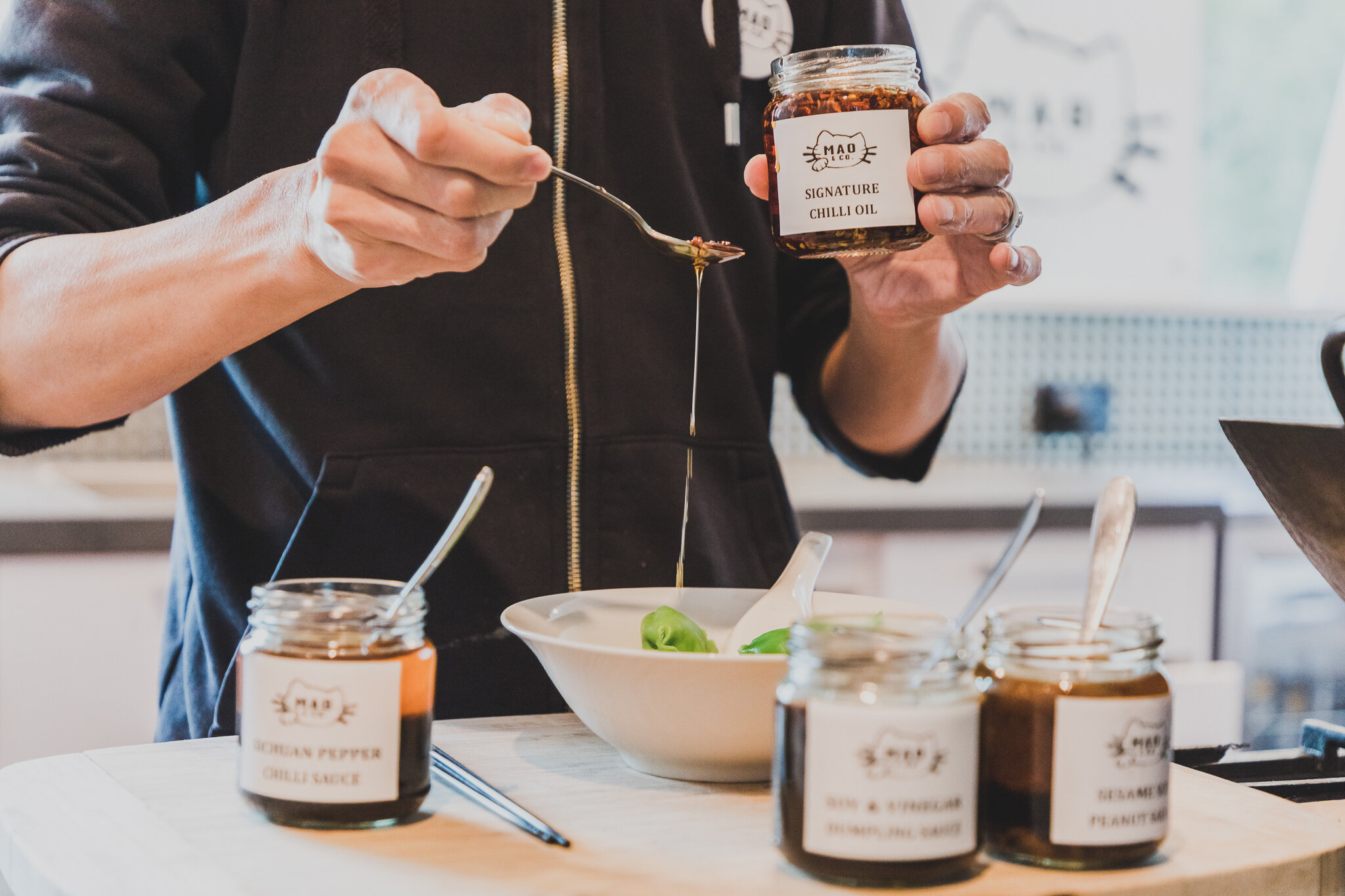 Jars of Signature Oils and Sauces